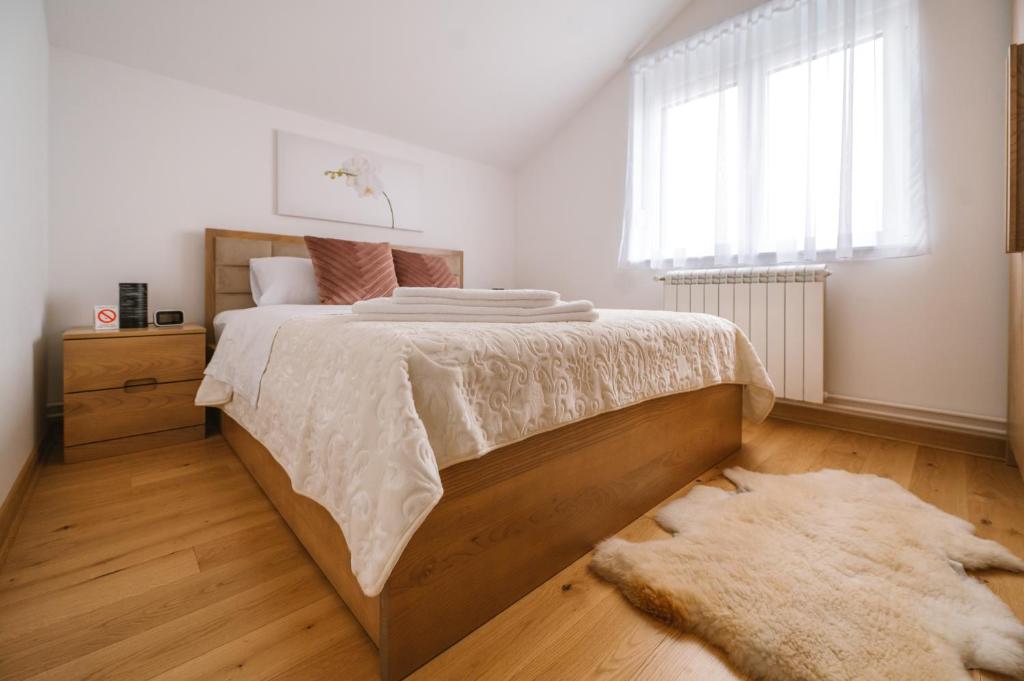 Postel nebo postele na pokoji v ubytování Mikonos apartman