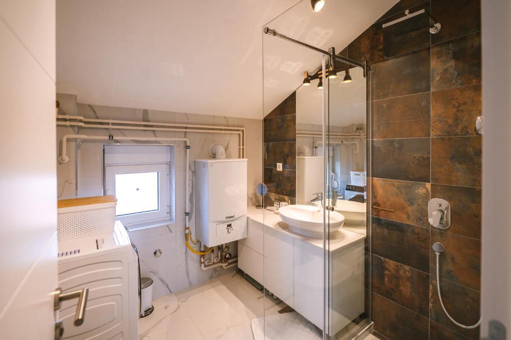 Koupelna v ubytování Mikonos apartman