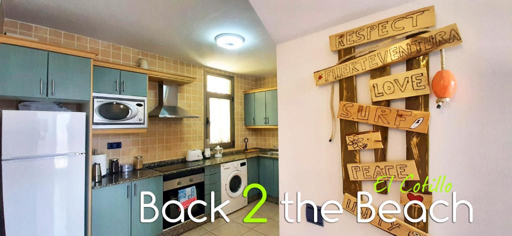 Kuchyň nebo kuchyňský kout v ubytování Duplex espacioso, tranquilidad, barbacoa y supermercado al lado