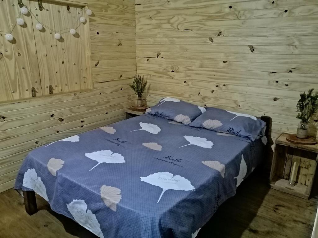 Llit o llits en una habitació de Cabaña Los Nietitos