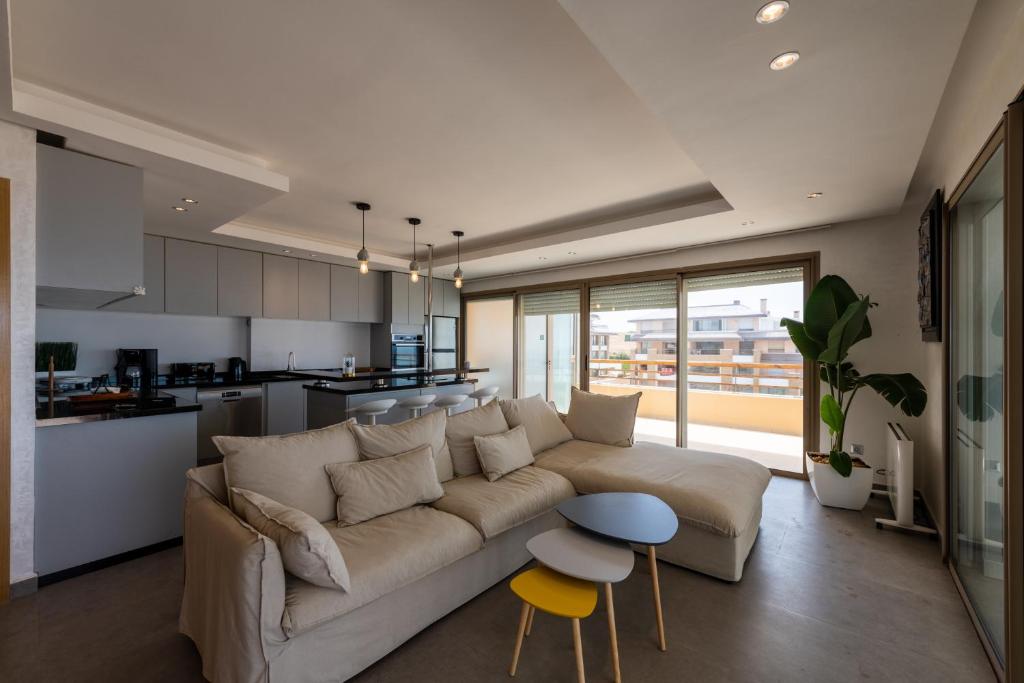Posezení v ubytování Appartement 300m2 vue sur océan Prestigia - Plage des nations
