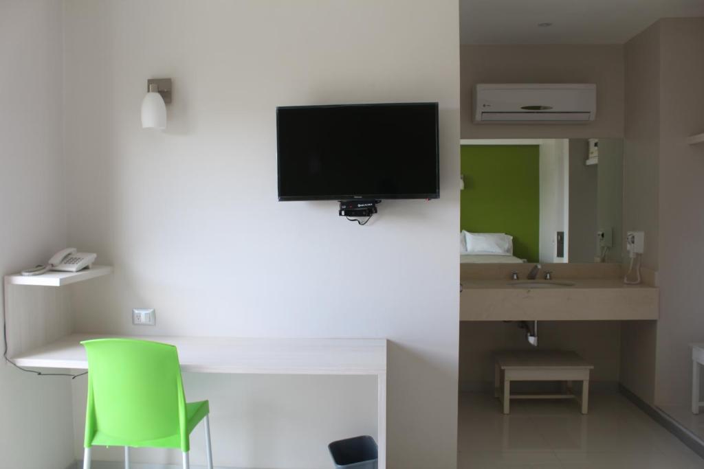 TV a/nebo společenská místnost v ubytování SC HOTEL