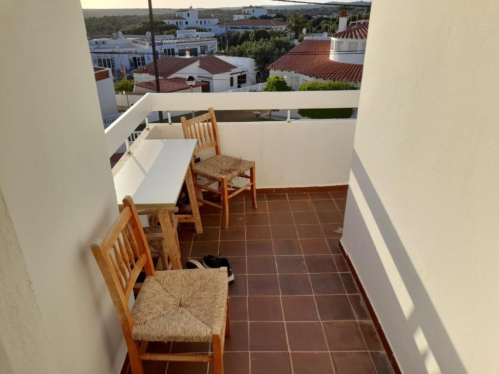 A balcony or terrace at Precioso apartamento residencial con piscina