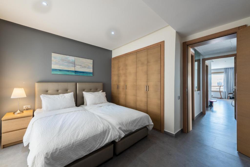 Postel nebo postele na pokoji v ubytování Appartement 300m2 vue sur océan Prestigia - Plage des nations