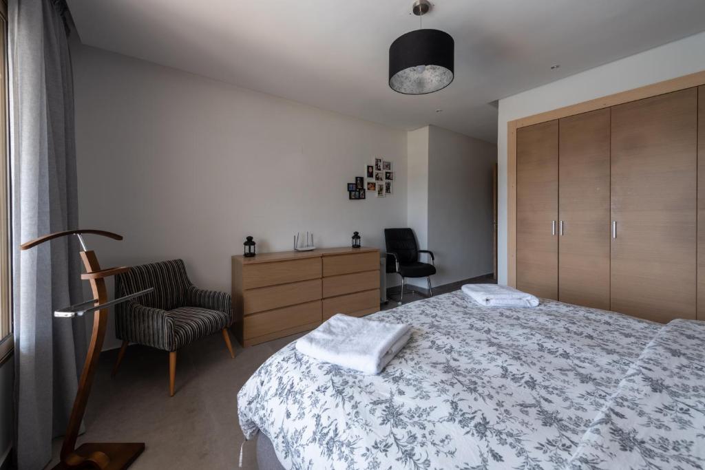 Postel nebo postele na pokoji v ubytování Appartement 300m2 vue sur océan Prestigia - Plage des nations