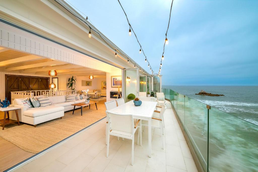 a living room with a view of the ocean at Big Rock Seaside Beach House in Malibu
