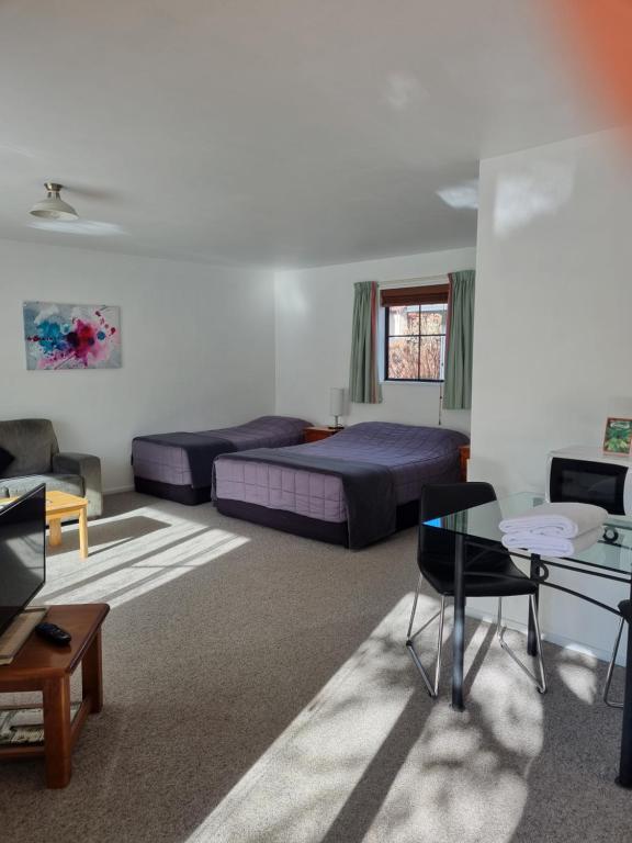 Posezení v ubytování Glenalvon Lodge Motel