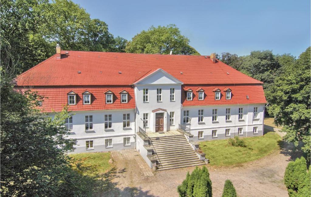 an aerial view of a large house with a red roof at Stunning Home In Gross Markow With Sauna in Groß Markow