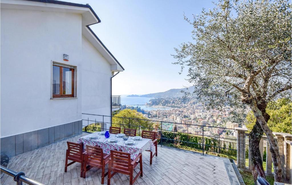 a table and chairs on a balcony with a view at Nice Home In Rapallo With Kitchen in Rapallo