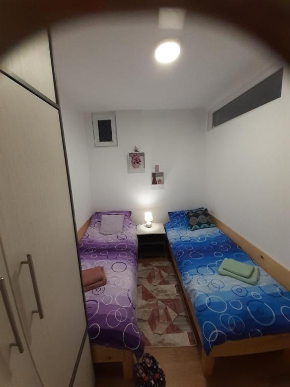 Una cama o camas en una habitación de Apartman Anđela i Aleksa Divčibare
