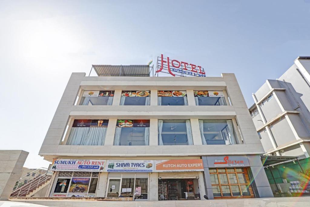 a tall building with a sign on top of it at KUTCH HERITAGE HOTEL in Gandhidham