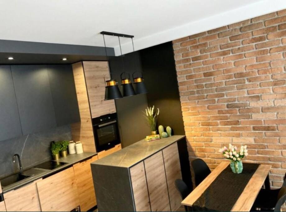 Kuchyňa alebo kuchynka v ubytovaní Turzycowa Loft - stylish apartment