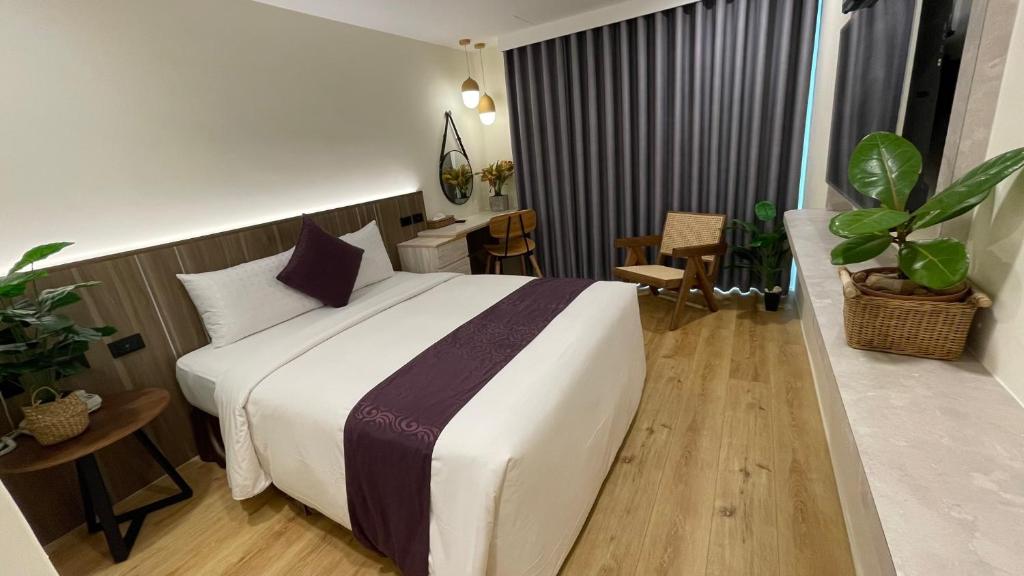 Postel nebo postele na pokoji v ubytování 海的墾丁旅店 Ocean KT Inn