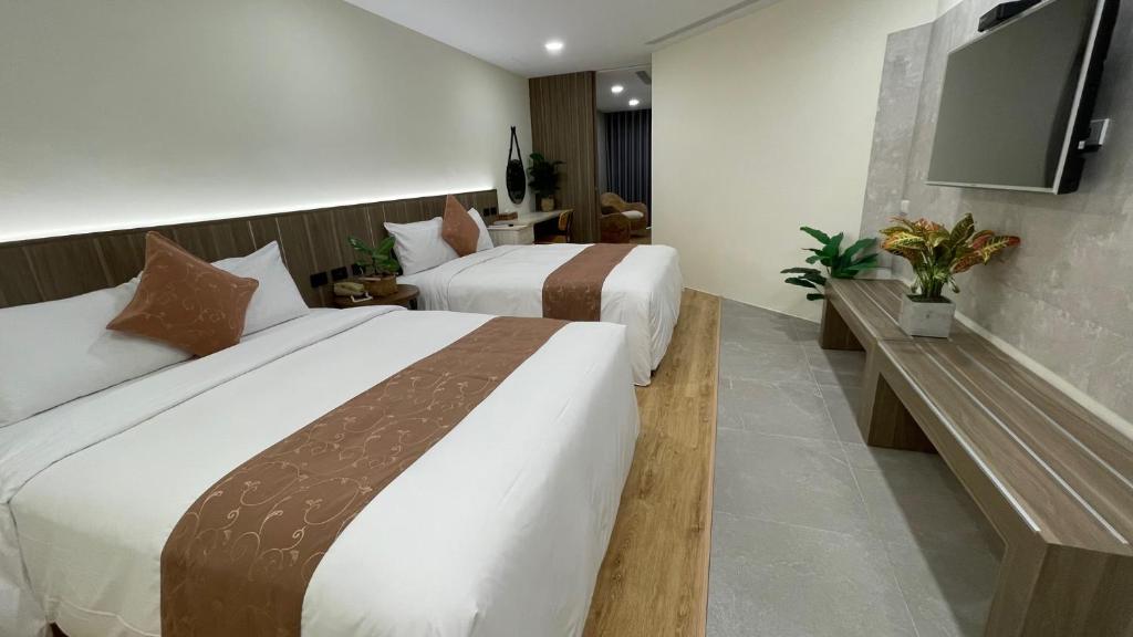 Postel nebo postele na pokoji v ubytování 海的墾丁旅店 Ocean KT Inn