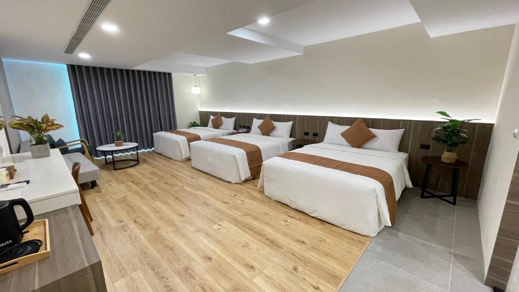 Postel nebo postele na pokoji v ubytování 海的墾丁旅店 Ocean KT Inn