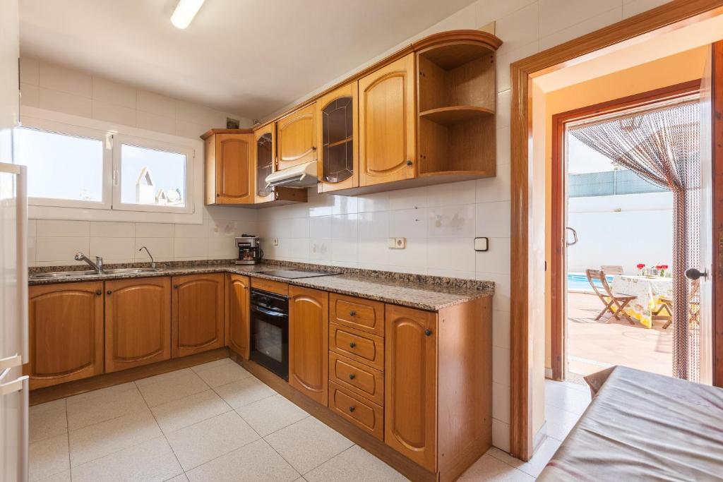 Kuchyň nebo kuchyňský kout v ubytování Villa Lilia