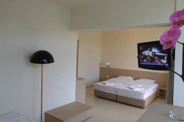 Postel nebo postele na pokoji v ubytování Hotel Sara