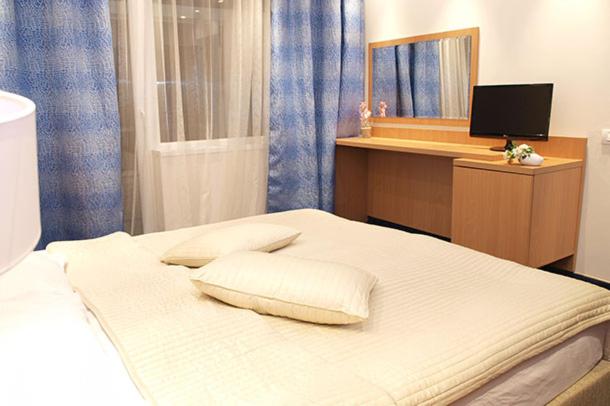 Postel nebo postele na pokoji v ubytování Hotel Sara
