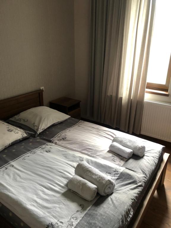 Postel nebo postele na pokoji v ubytování Hill House