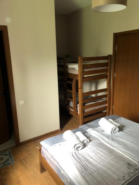 Postel nebo postele na pokoji v ubytování Hill House