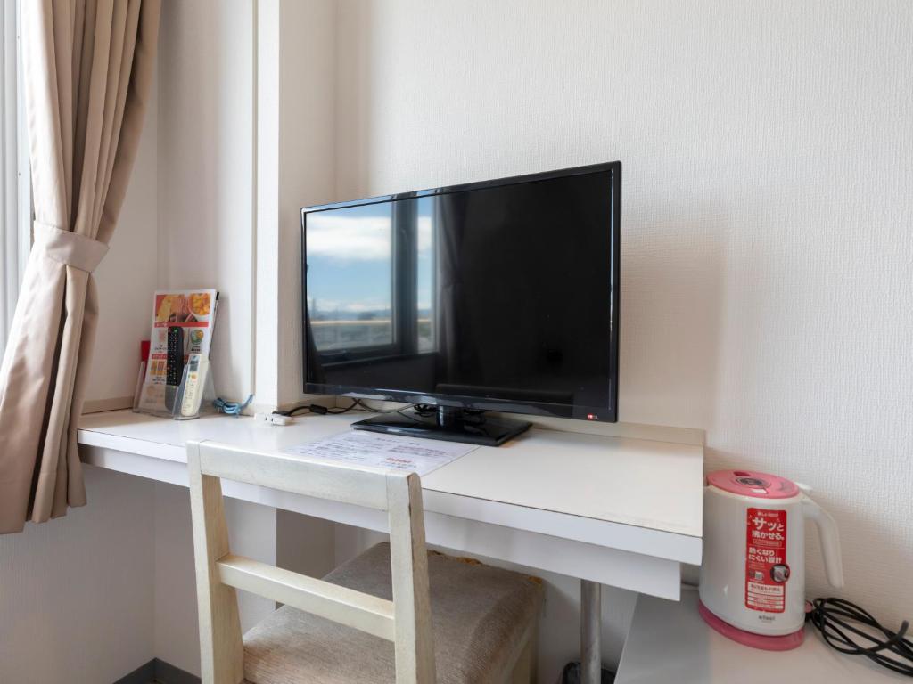 TV a/nebo společenská místnost v ubytování Tabist Hotel Yuan Akashi
