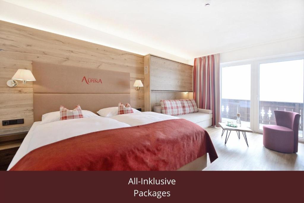 מיטה או מיטות בחדר ב-Hotel Alpina Superior