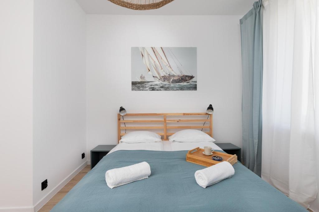 Posteľ alebo postele v izbe v ubytovaní Marina Corner Apartment Gdynia by Noclegi Renters