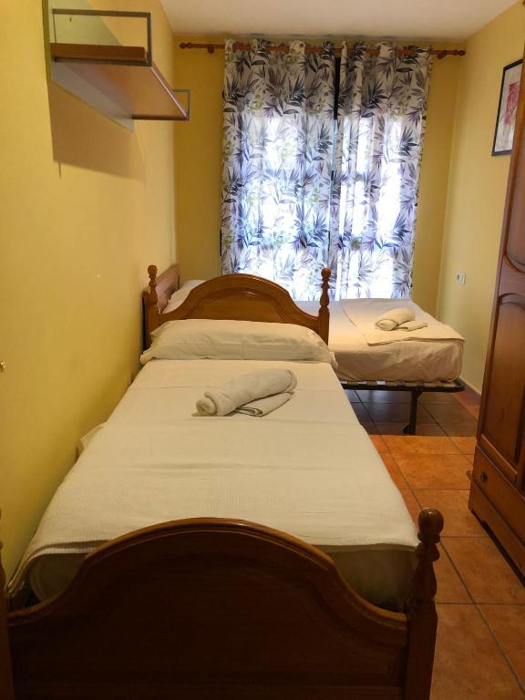 Posteľ alebo postele v izbe v ubytovaní VistaMar beautiful apartment with amazing sea view Pineda de Mar