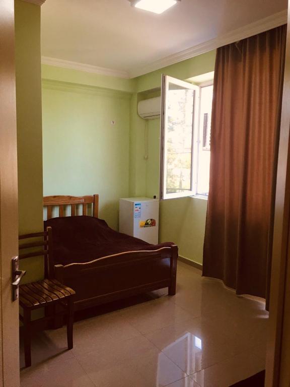 Postel nebo postele na pokoji v ubytování Hotel Lotus