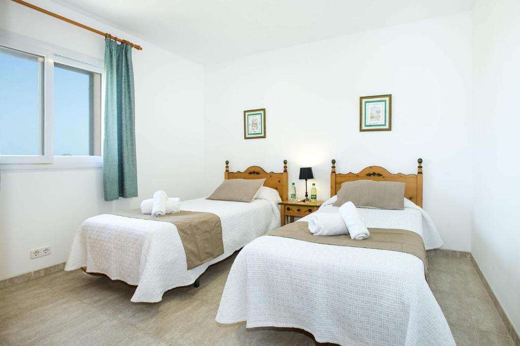 Postel nebo postele na pokoji v ubytování Villa Illa Petita by Villa Plus