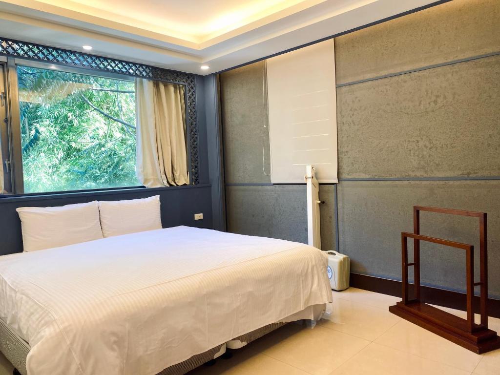 Postel nebo postele na pokoji v ubytování Spa Spring Resort