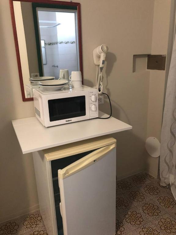Kuchyň nebo kuchyňský kout v ubytování Hotel Wega