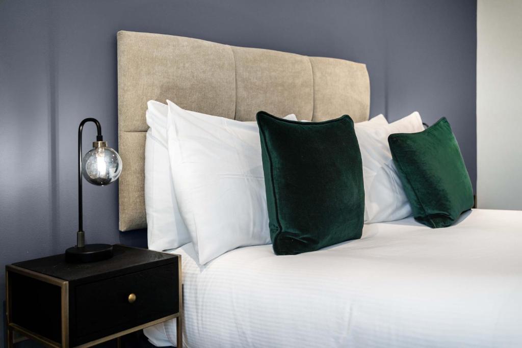 Postel nebo postele na pokoji v ubytování The Regent Aparthotel