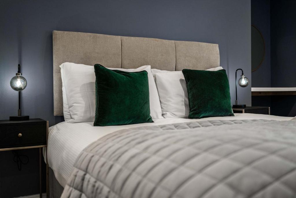 Postel nebo postele na pokoji v ubytování The Regent Aparthotel
