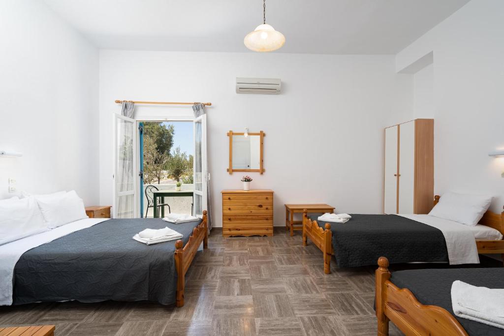 Postel nebo postele na pokoji v ubytování Porto Villa