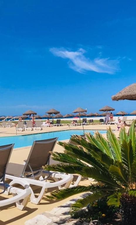 Bazén v ubytování Baia dei Mulini Resort & Spa nebo v jeho okolí