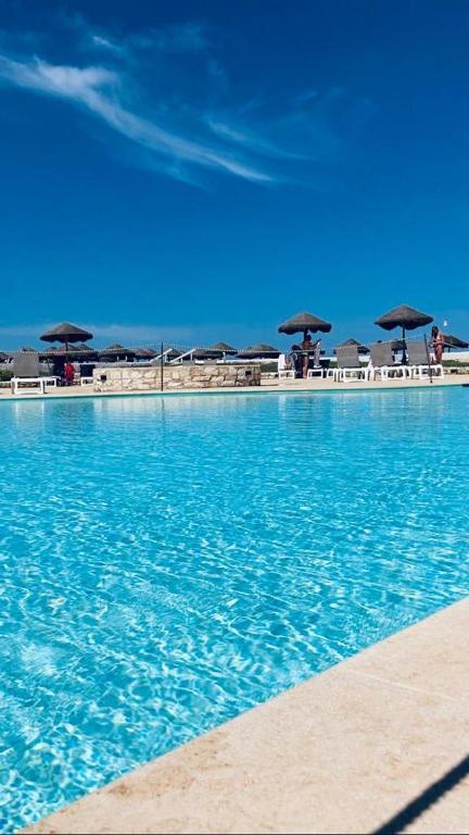 Bazén v ubytování Baia dei Mulini Resort & Spa nebo v jeho okolí