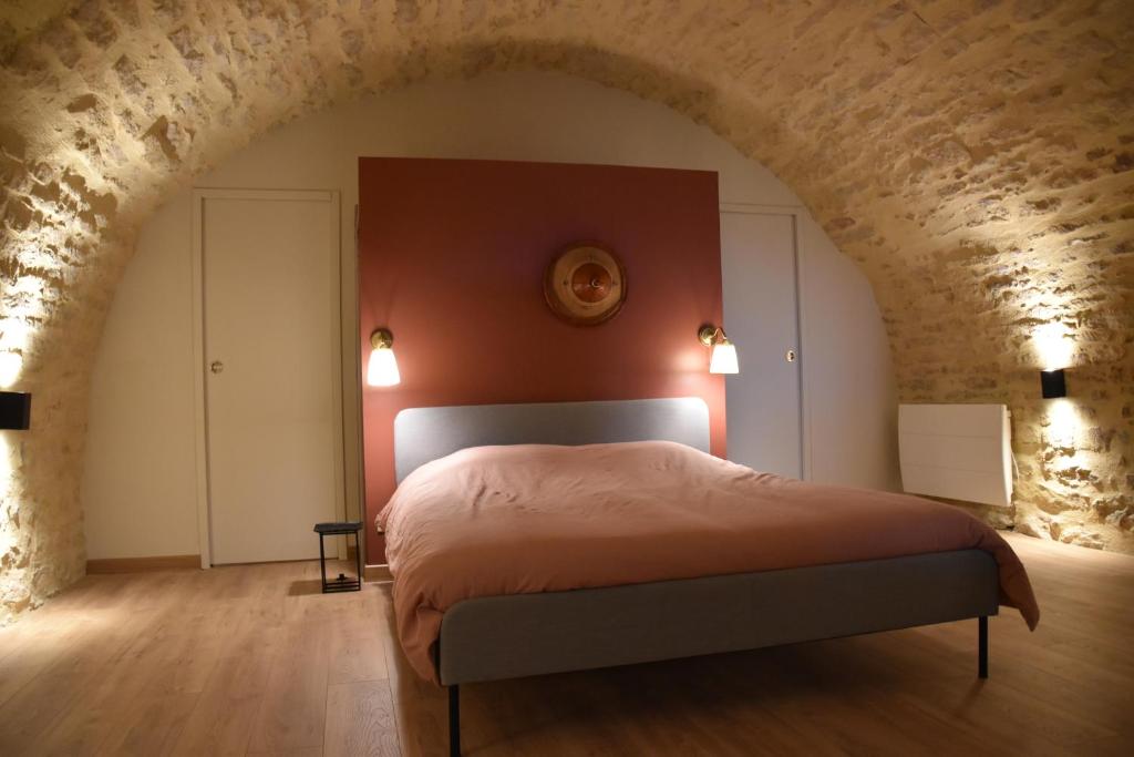Krevet ili kreveti u jedinici u objektu Le refuge de la Sall&eacute;e