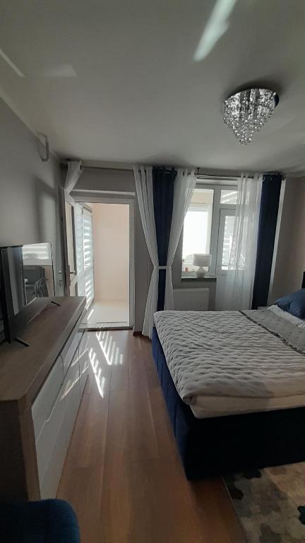 Posteľ alebo postele v izbe v ubytovaní Pokoje gościnne nad morzem