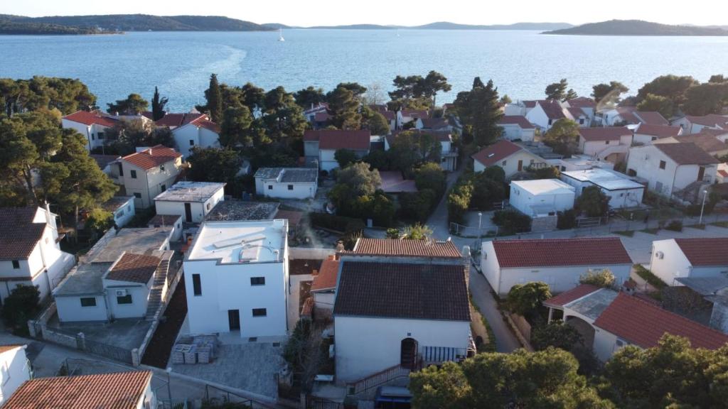 an aerial view of a town by the water at Apartmani Kober in Šibenik
