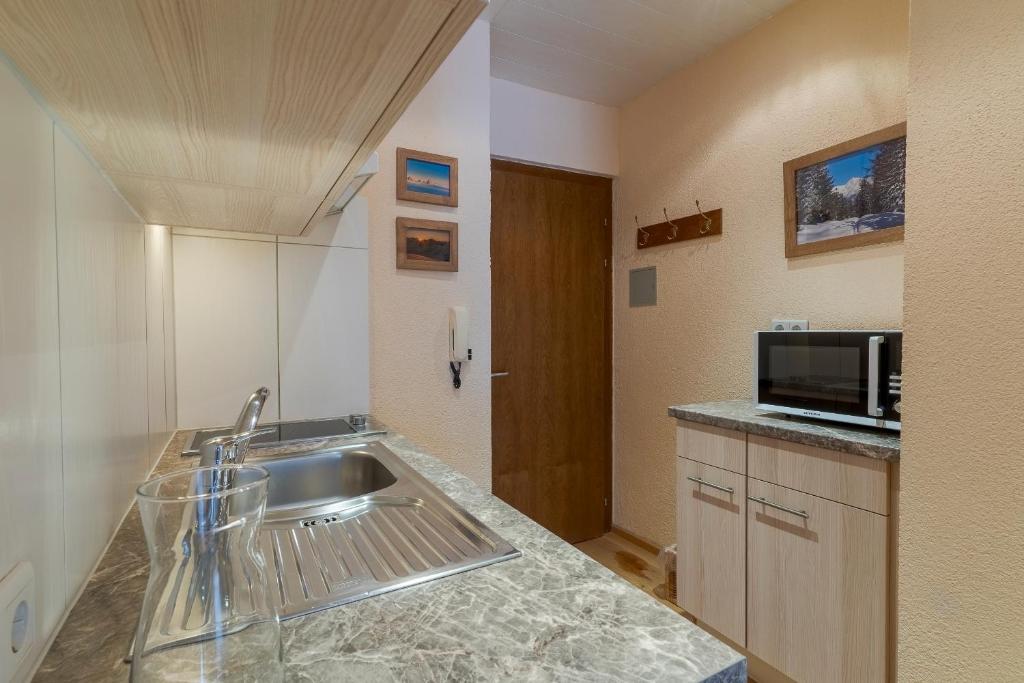 Televízia a/alebo spoločenská miestnosť v ubytovaní SR Apartments GmbH Rabitschhof