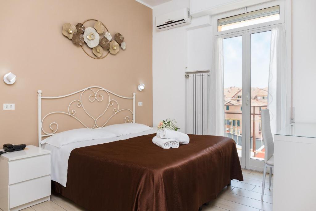 Кровать или кровати в номере Hotel Villa Lina