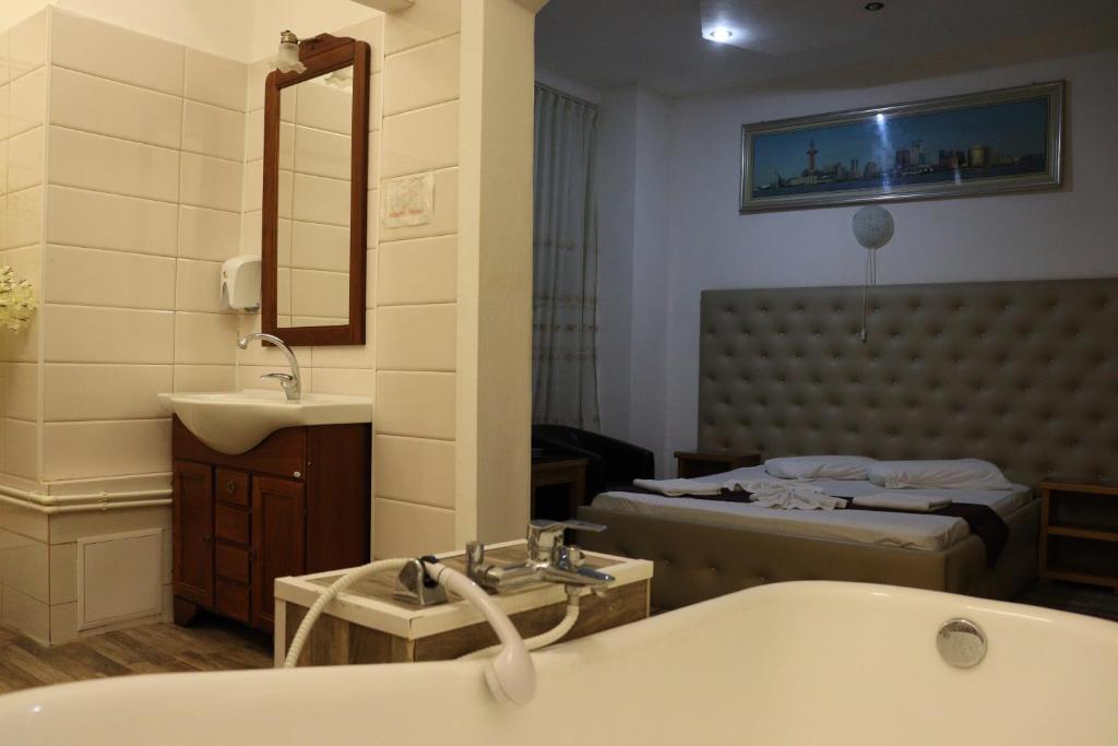 Postel nebo postele na pokoji v ubytování Hotel Funnytime