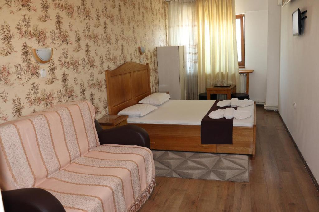 Postel nebo postele na pokoji v ubytování Hotel Funnytime