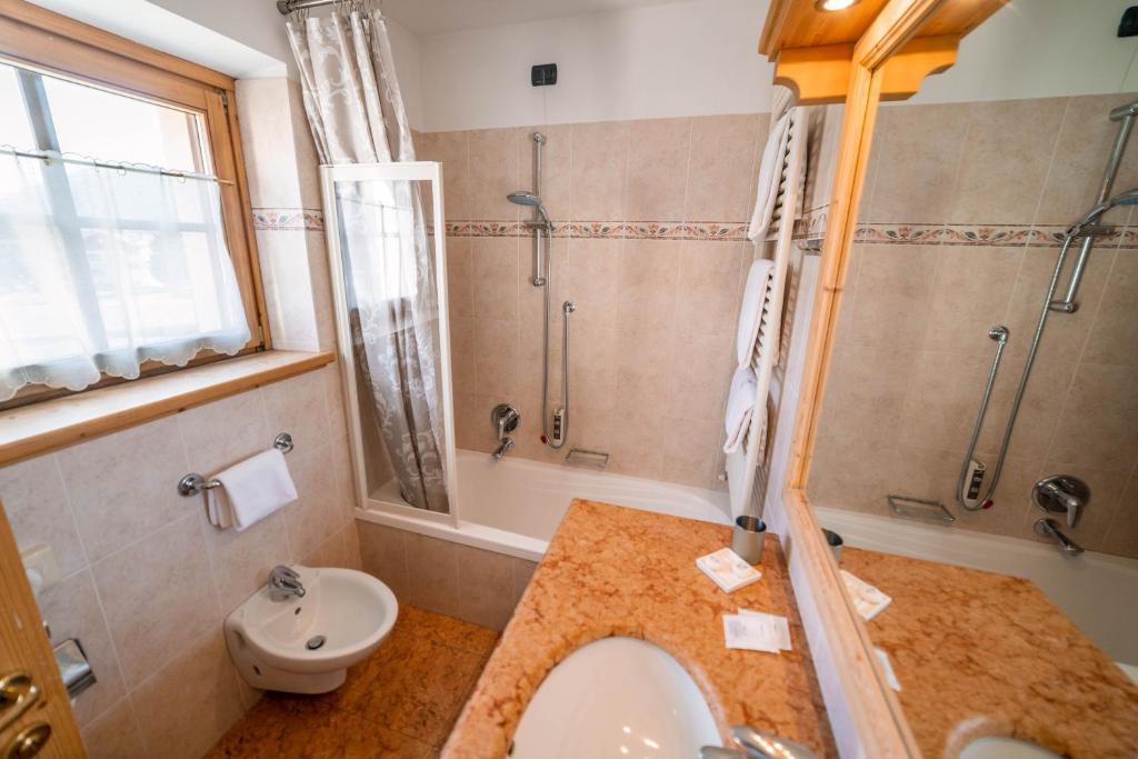 Koupelna v ubytování Alpi & Golf Hotel