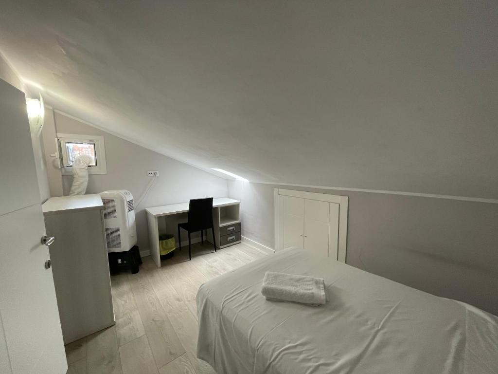 Postel nebo postele na pokoji v ubytování La Rosa Azul Rooms-Grupo Rosa Azul