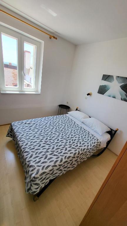 Posteľ alebo postele v izbe v ubytovaní Old Market Apartment