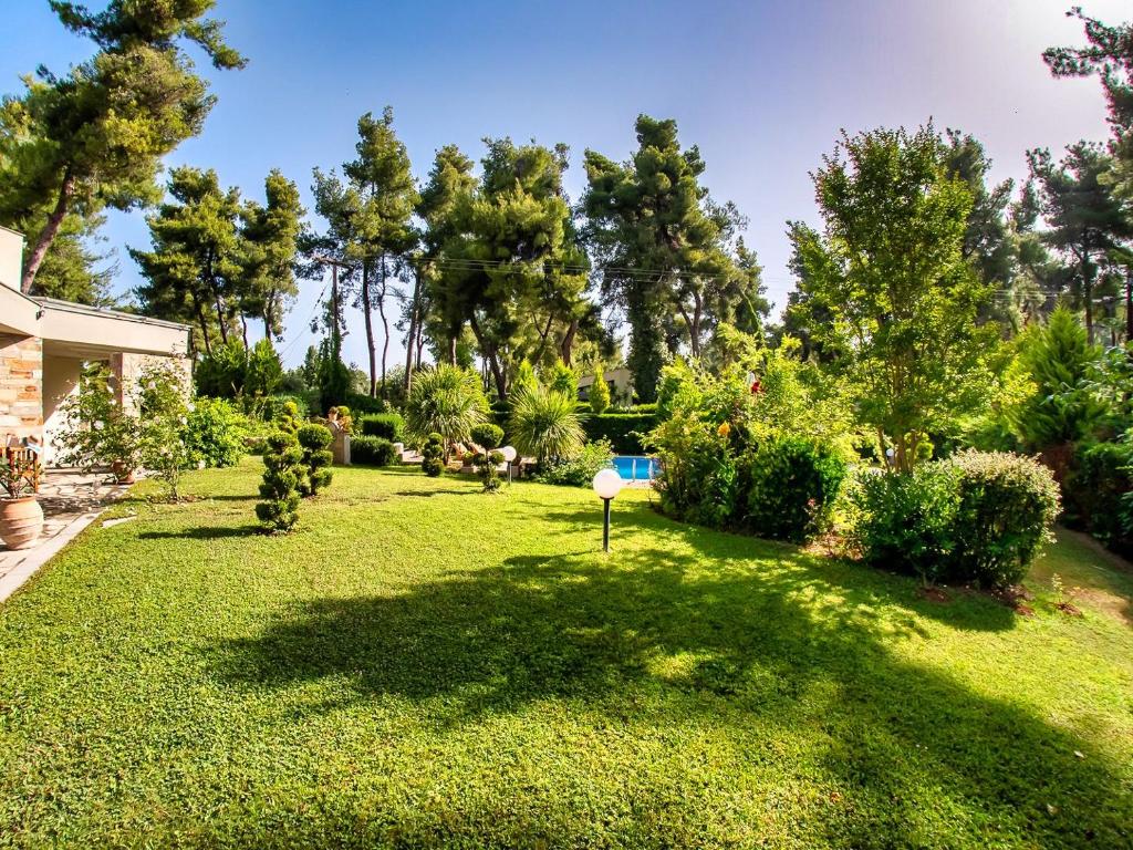 A garden outside Sani Green Villa