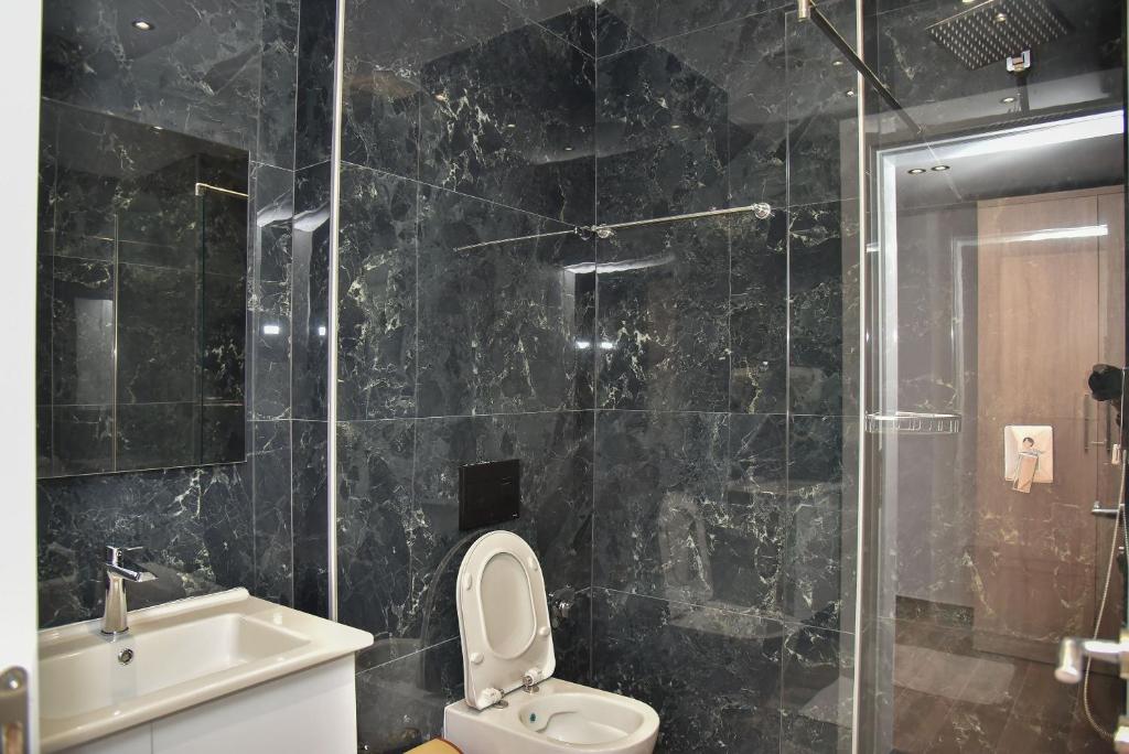 Koupelna v ubytování Hotel Lubjana