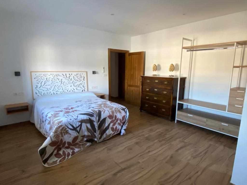 Postel nebo postele na pokoji v ubytování El cortijo del abuelo pepe